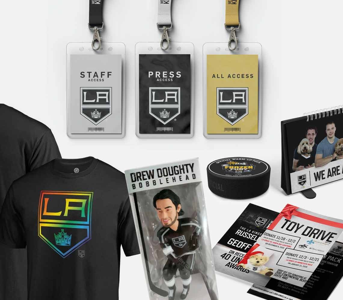 LA Kings collateral: shirts, cards, pucks, and flyers