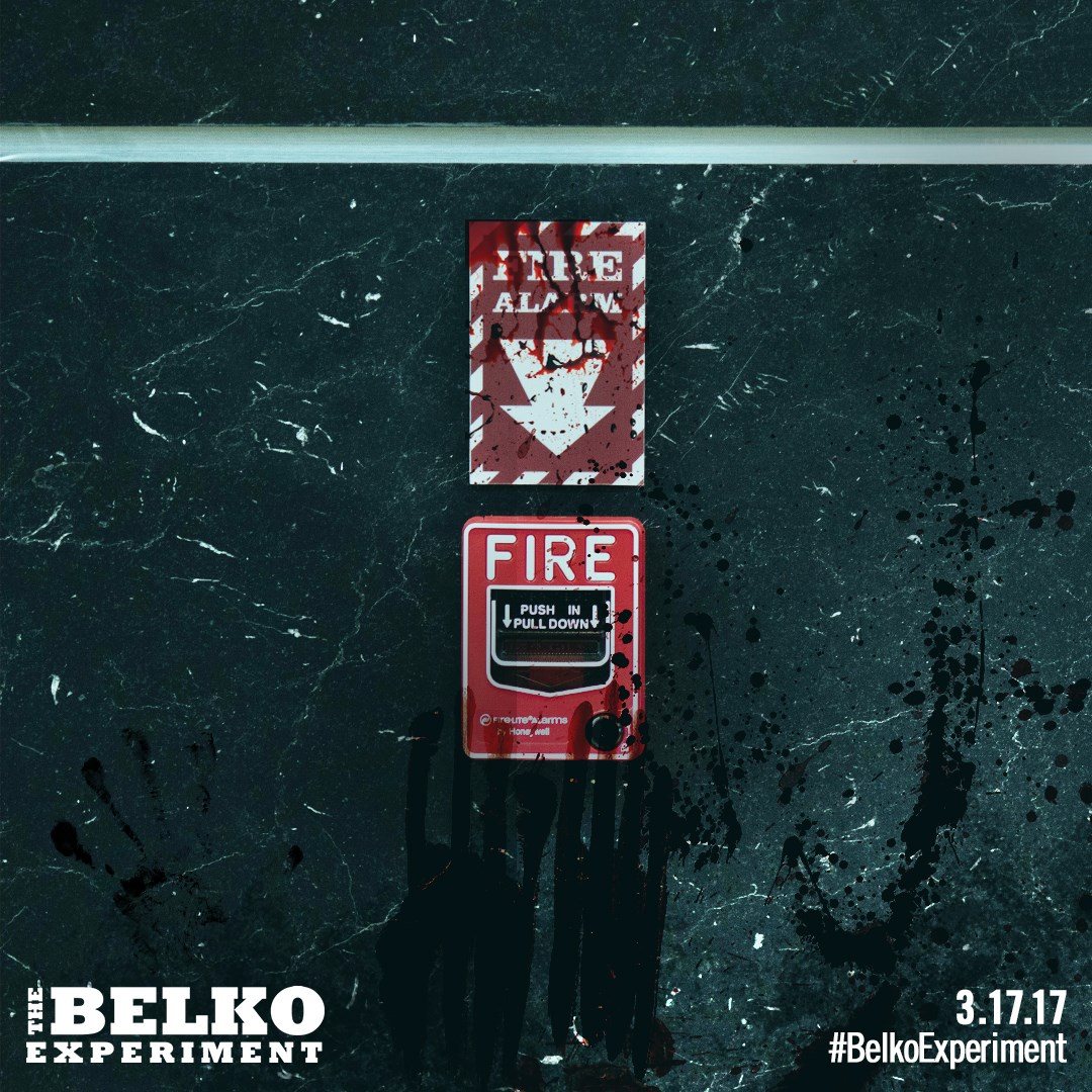 A bloodied fire alarm on a marble wall