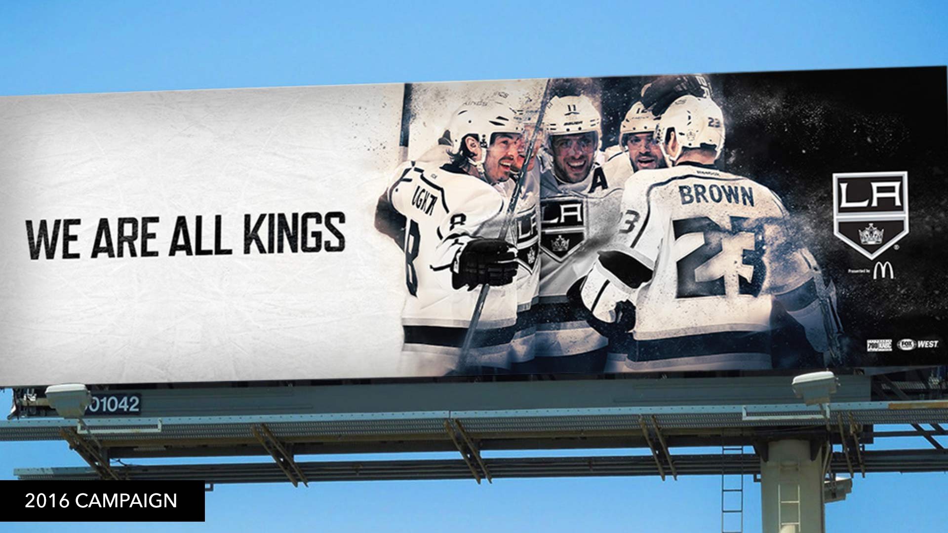 The team bulletin on a billboard against a blue sky