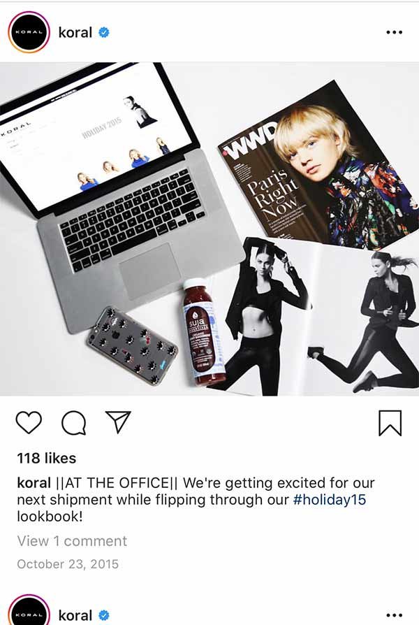 A Koral Instagram flat lay of a laptop, a lookbook and leggings