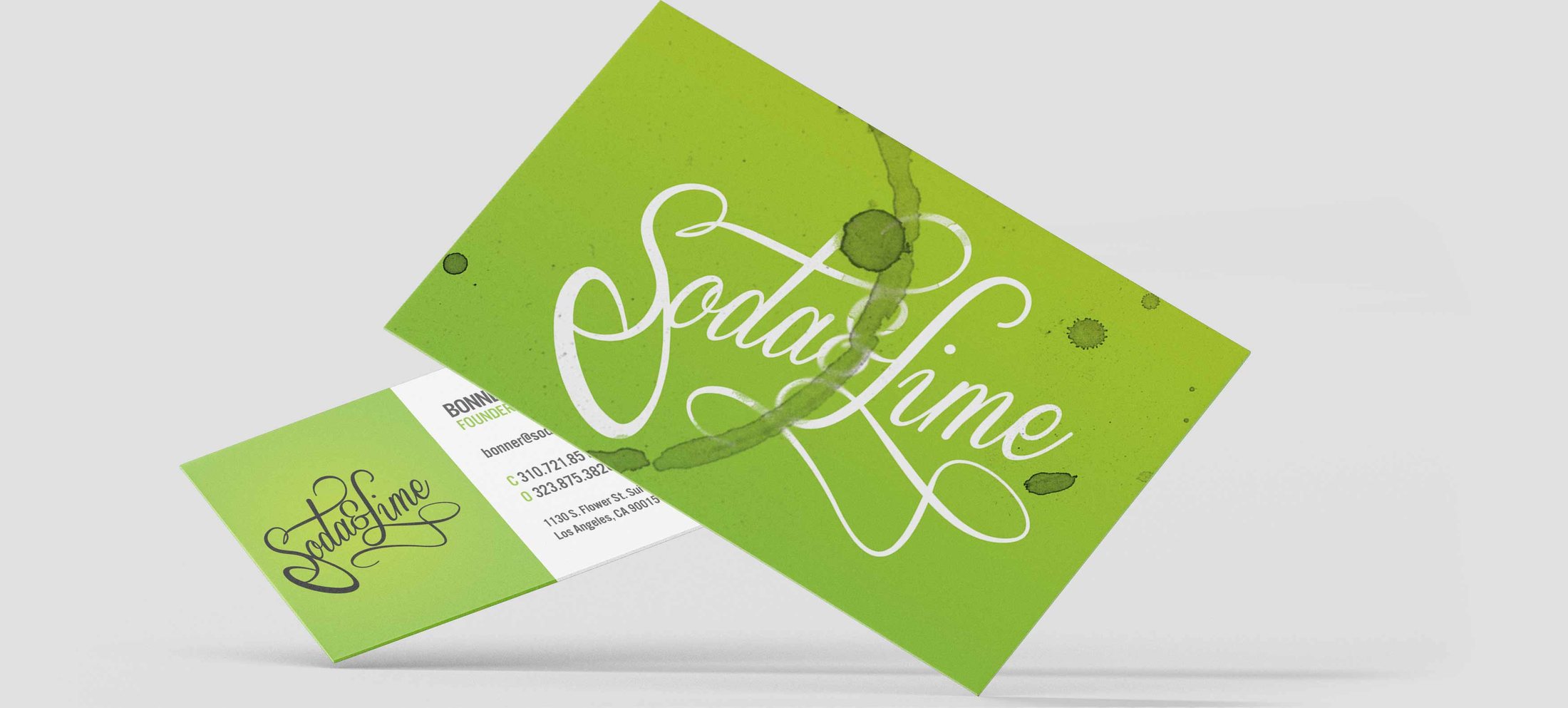Green Soda & Lime business cards with a citrus pattern