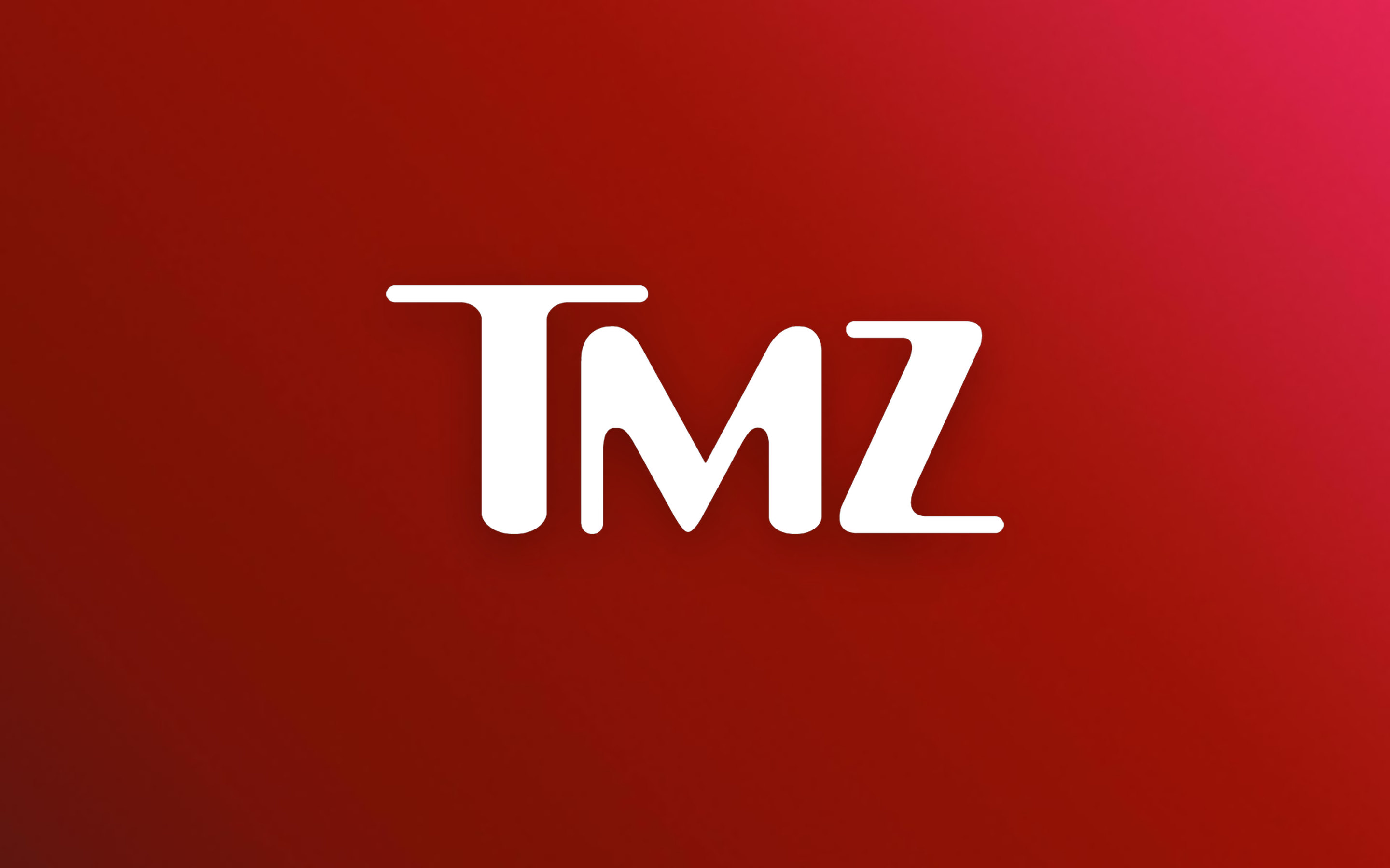 The white TMZ wordmark on a deep red field