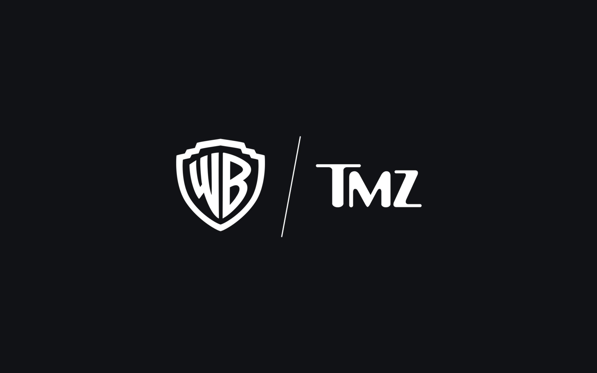 The Warner Bros. shield beside the TMZ wordmark